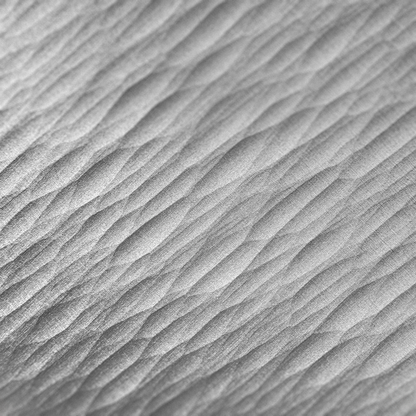 Close-up of directional grooves on the DRIFT aluminum coaster
